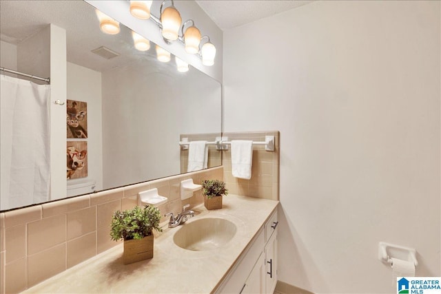 full bathroom with tasteful backsplash, visible vents, vanity, and a shower with shower curtain