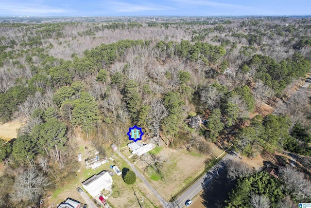 drone / aerial view with a forest view