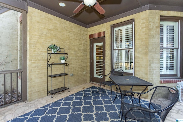 view of patio featuring ceiling fan