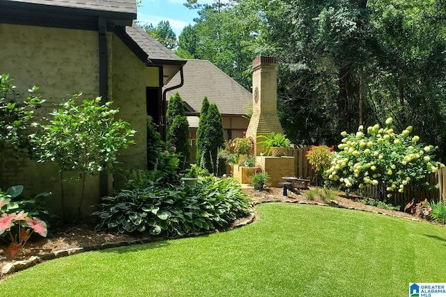 view of yard with fence