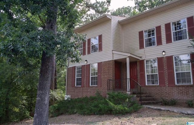 view of front of property with brick siding