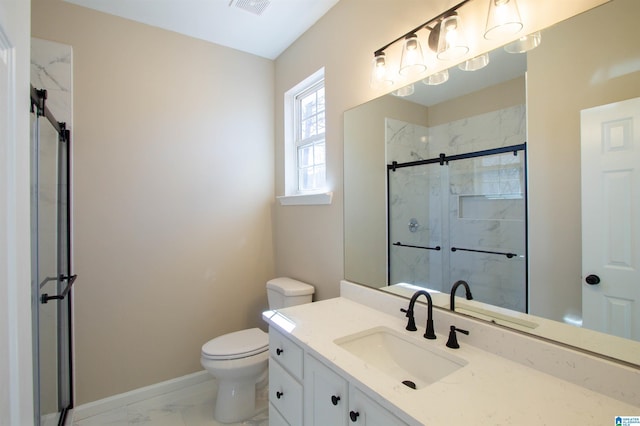 bathroom featuring baseboards, toilet, marble finish floor, vanity, and a shower stall