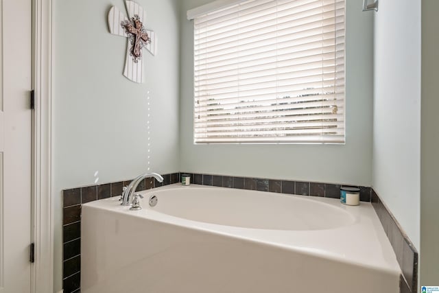 bathroom featuring a garden tub