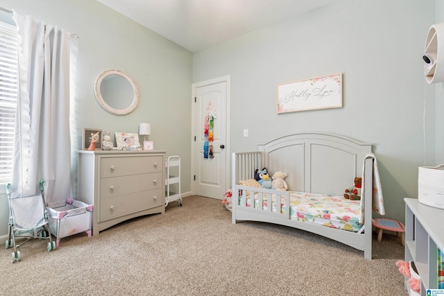 bedroom featuring carpet