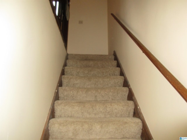 staircase with baseboards