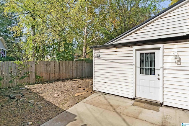 view of outbuilding with fence