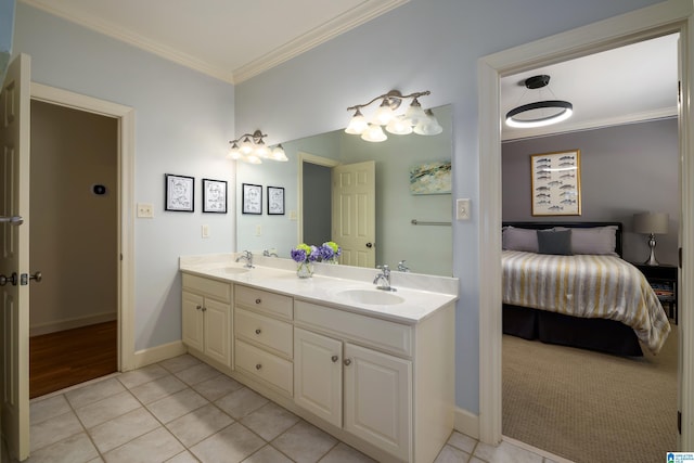 bathroom featuring crown molding, tile patterned flooring, a sink, and double vanity