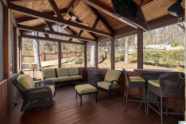 sunroom / solarium with wooden ceiling and vaulted ceiling with beams