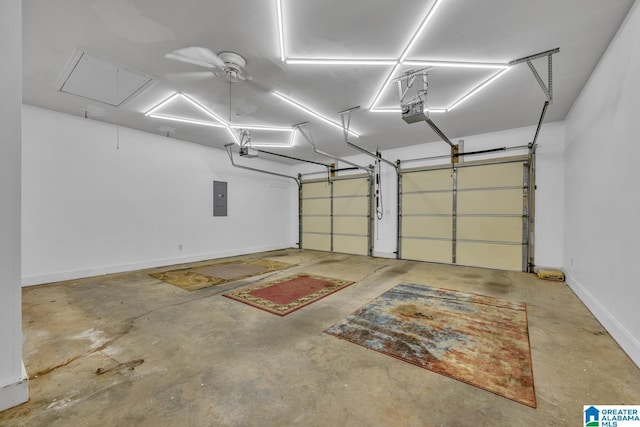 garage featuring electric panel, baseboards, and a garage door opener