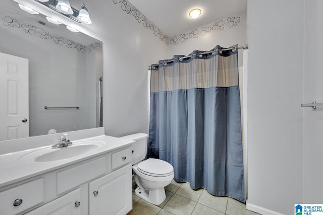 bathroom featuring curtained shower, tile patterned flooring, toilet, visible vents, and vanity