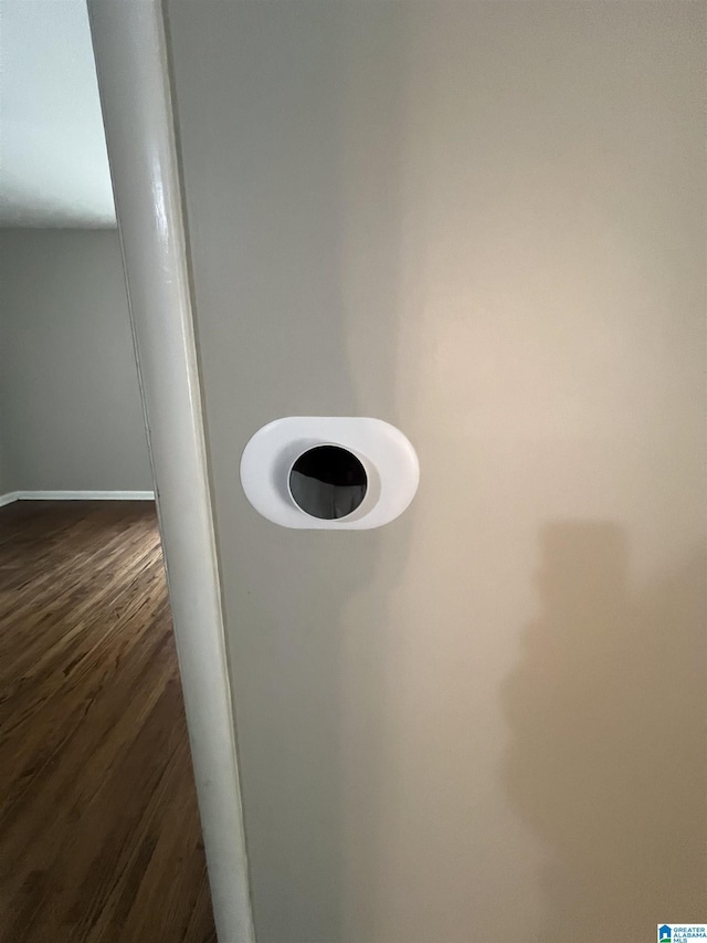 room details with wood finished floors and baseboards