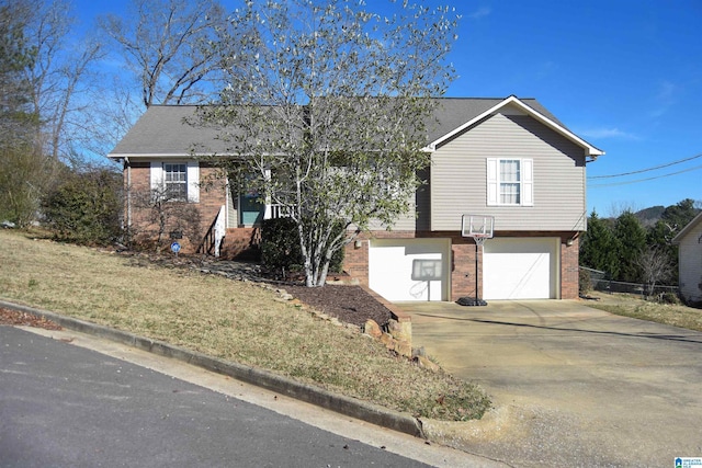 view of front of home featuring driveway, an attached garage, and brick siding