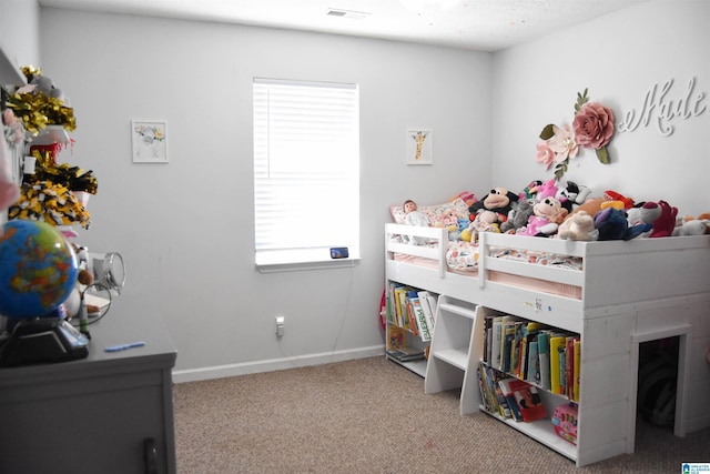 bedroom featuring carpet, visible vents, and baseboards