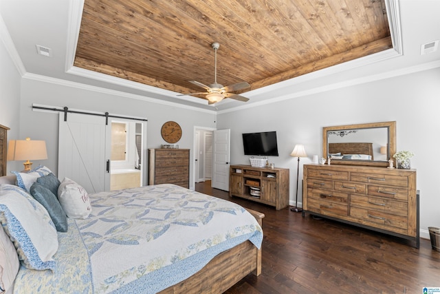 bedroom featuring wooden ceiling, a barn door, and a tray ceiling