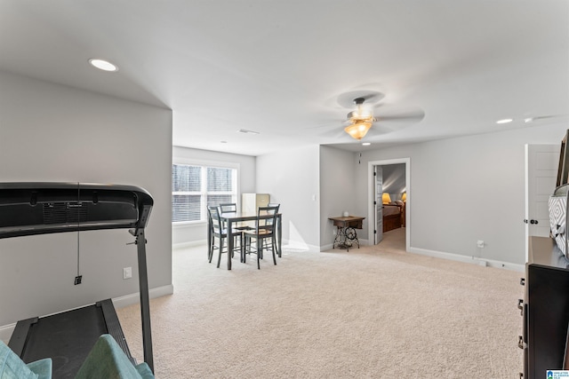 exercise area featuring a ceiling fan, carpet, baseboards, and recessed lighting