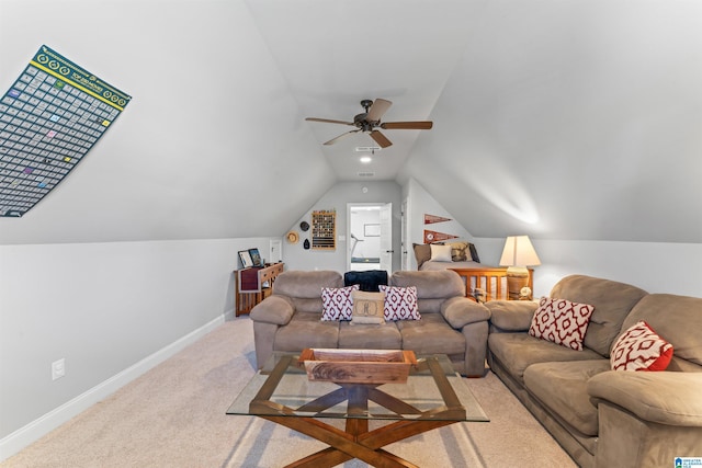 living room with a ceiling fan, carpet, vaulted ceiling, and baseboards