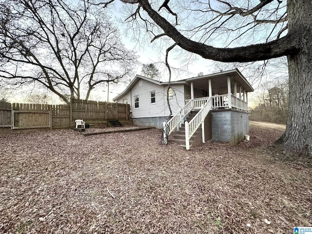 exterior space with stairway and fence