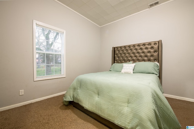 bedroom with visible vents, baseboards, carpet, and ornamental molding