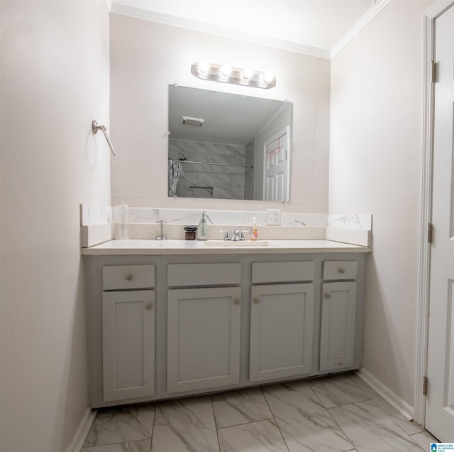 bathroom with marble finish floor, vanity, crown molding, and a shower with curtain