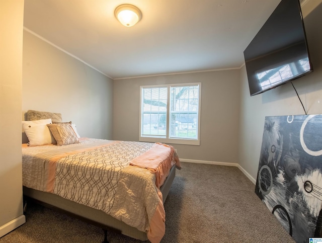 carpeted bedroom with baseboards and ornamental molding