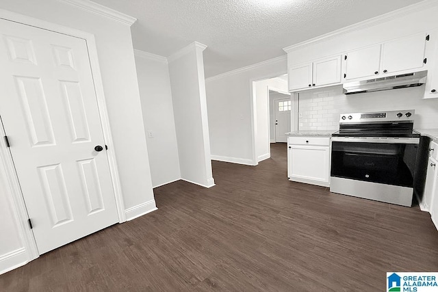 kitchen featuring under cabinet range hood, light countertops, dark wood finished floors, stainless steel range with electric stovetop, and crown molding