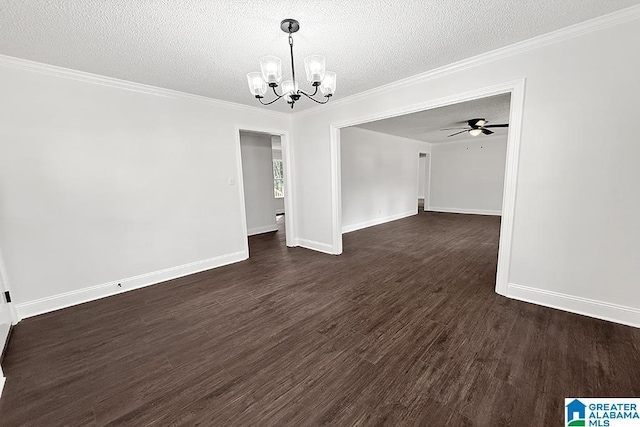 unfurnished dining area with a textured ceiling, dark wood-type flooring, ceiling fan with notable chandelier, and ornamental molding