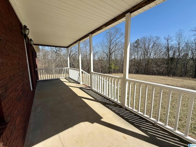 balcony featuring a porch