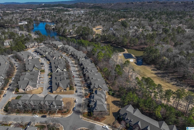 bird's eye view with a water view and a residential view