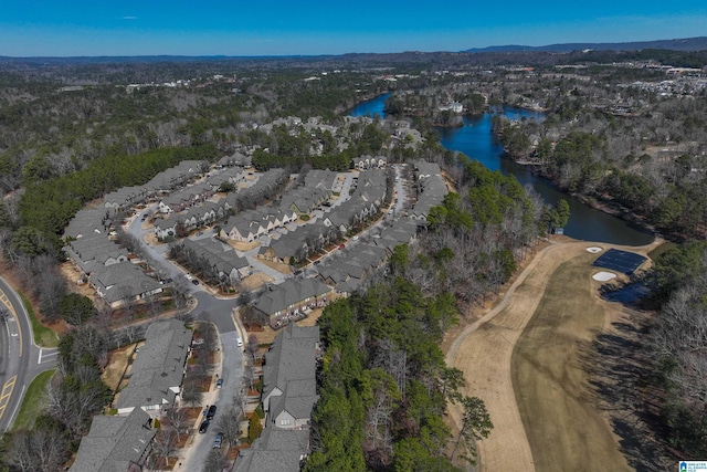 aerial view featuring a residential view and a water view