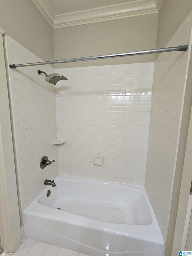 bathroom featuring washtub / shower combination, crown molding, and tile patterned floors