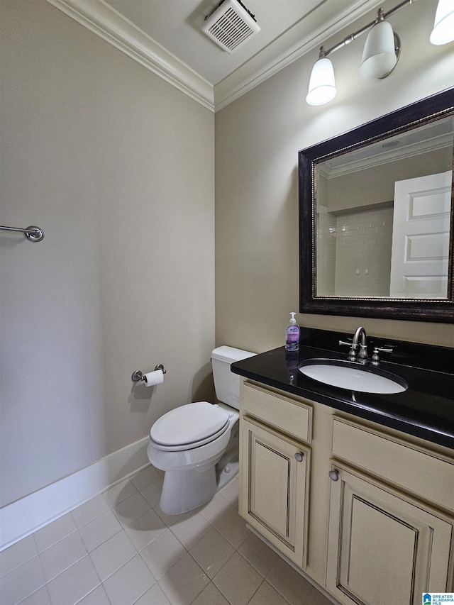 bathroom with visible vents, toilet, ornamental molding, vanity, and tile patterned floors