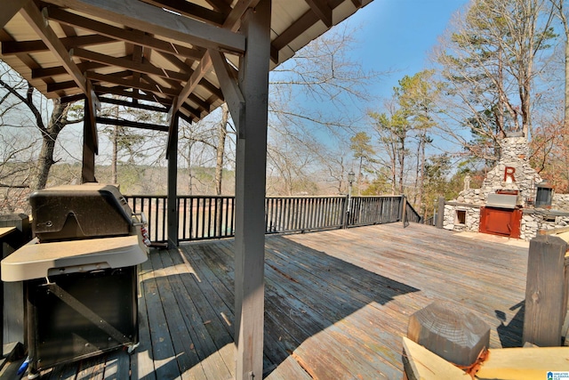 wooden terrace with grilling area