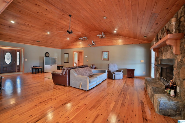 living room featuring a fireplace, lofted ceiling, ceiling fan, wooden ceiling, and hardwood / wood-style flooring