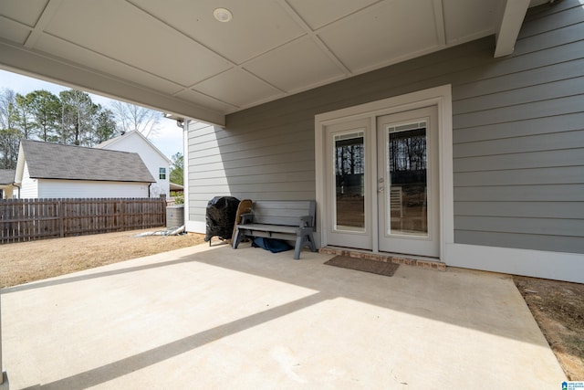 view of patio featuring fence