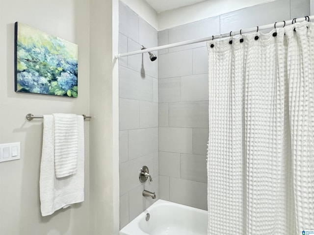 full bathroom featuring shower / bath combo with shower curtain