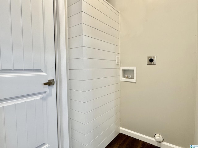 laundry area featuring dark wood-style floors, washer hookup, electric dryer hookup, laundry area, and baseboards