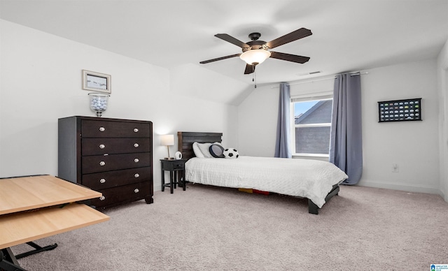 carpeted bedroom with visible vents, ceiling fan, lofted ceiling, and baseboards