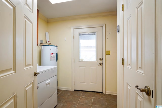 doorway with baseboards, water heater, washer / clothes dryer, and crown molding