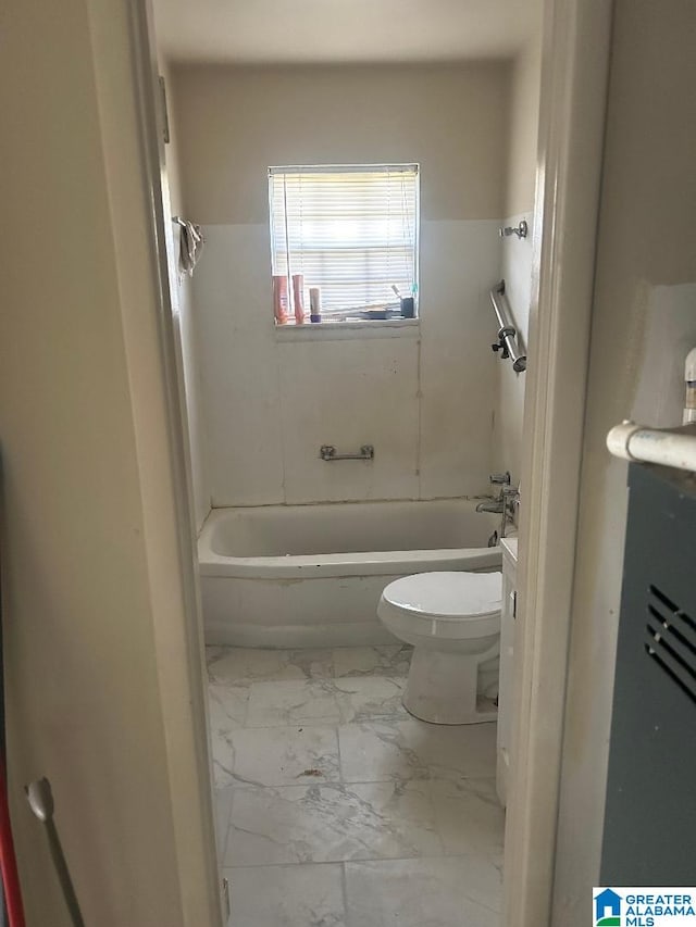 full bathroom with shower / washtub combination, marble finish floor, and toilet