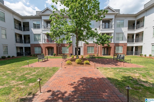 surrounding community featuring a lawn