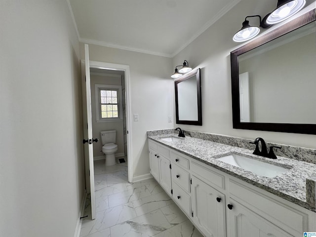 bathroom with baseboards, marble finish floor, a sink, and crown molding