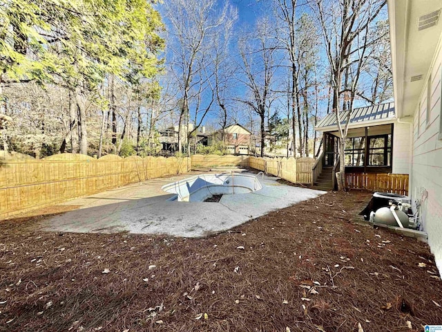 view of yard featuring a fenced backyard and a patio