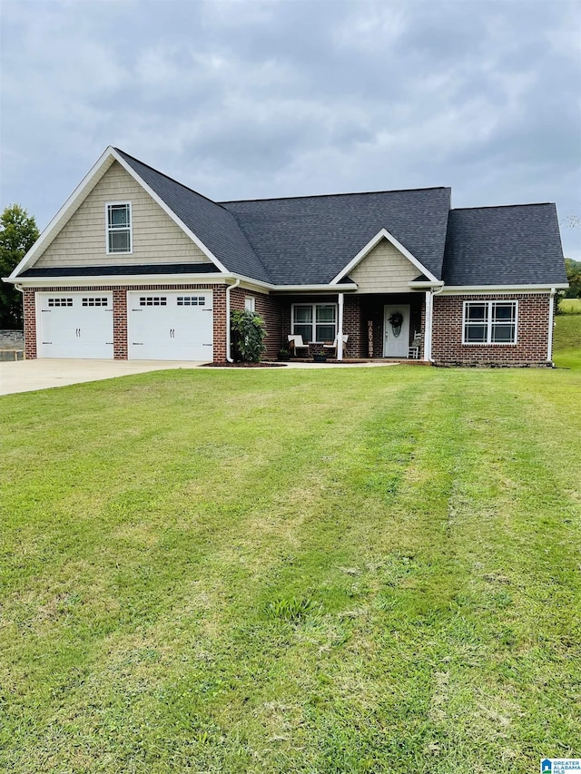 view of front facade featuring a front yard, concrete driveway, brick siding, and roof with shingles