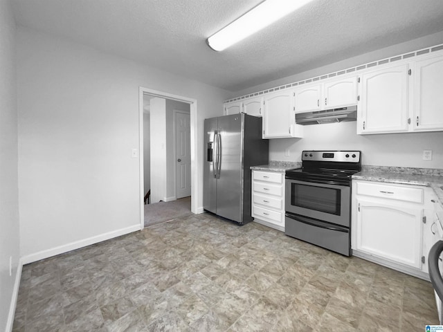 kitchen featuring baseboards, appliances with stainless steel finishes, a textured ceiling, under cabinet range hood, and white cabinetry