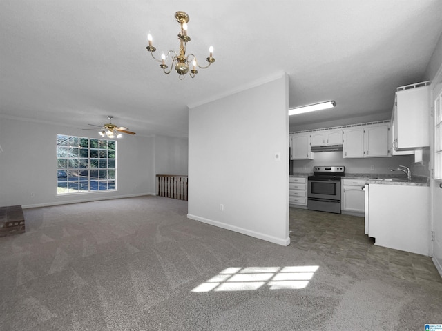 unfurnished living room with carpet flooring, a sink, baseboards, and ceiling fan with notable chandelier