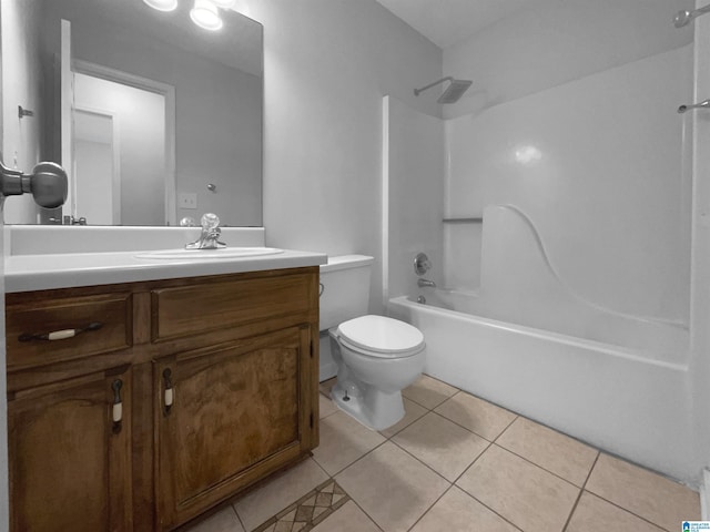 full bathroom featuring bathtub / shower combination, vanity, toilet, and tile patterned floors