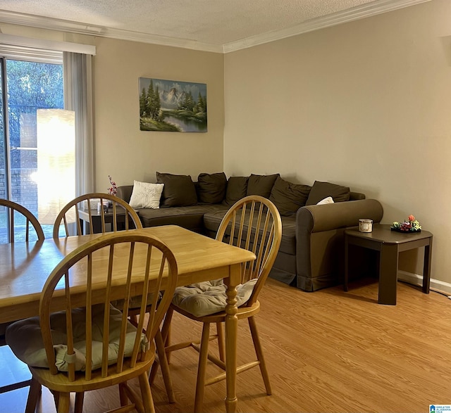 171 Old Montgomery Hwy Unit A, Homewood, AL 35216 - dining room featuring crown molding, light wood finished floors, and a textured ceiling