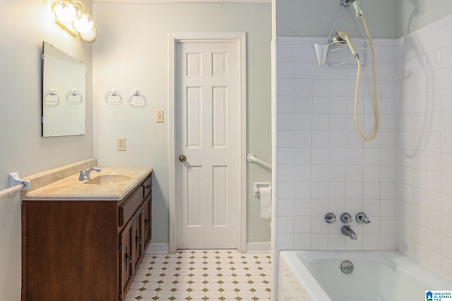 full bathroom featuring shower / bathing tub combination, vanity, and baseboards