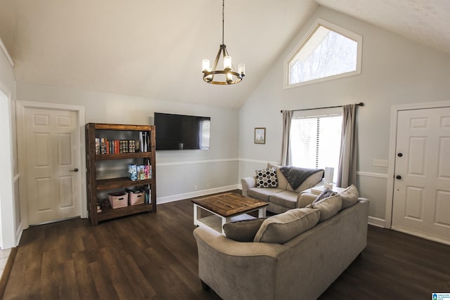 living room featuring baseboards, high vaulted ceiling, dark wood finished floors, and an inviting chandelier