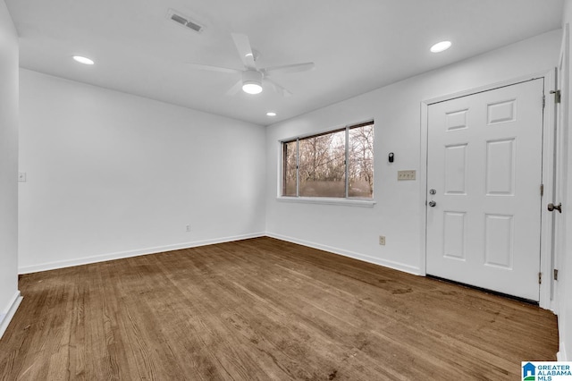 entrance foyer with recessed lighting, wood finished floors, a ceiling fan, visible vents, and baseboards